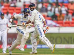 Hyderabad: India's batters Ravindra Jadeja and KL Rahul run between the wickets ...