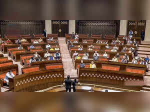 **EDS: VIDEO GRAB VIA SANSAD TV** New Delhi: Parliamentarians in the Rajya Sabha...