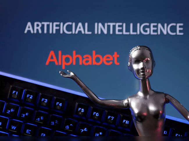 Illustration shows Alphabet logo and AI Artificial Intelligence words