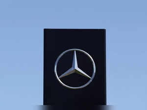 FILE PHOTO: A logo of Mercedes-Benz is seen outside a Mercedes-Benz car dealer, amid the coronavirus disease (COVID-19) outbreak in Brussels