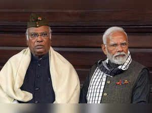 New Delhi: Prime Minister Narendra Modi and Congress President Mallikarjun Kharg...