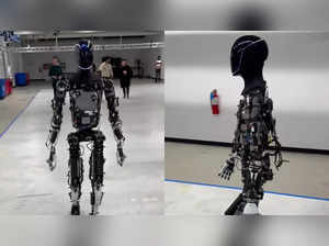 Elon Musk takes Tesla’s humanoid robot Optimus for a test walk. Netizens react, ask him to "Kill it with fire!"