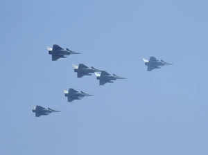 New Delhi: Six Rafale aircrafts fly past in 'Marut' formation during the 75th Re...