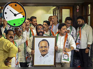Mumbai: Supporters of NCP (Ajit Pawar’s faction) celebrate after the Election Co...
