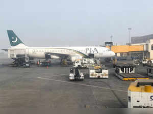 FILE PHOTO: View of a Pakistan International Airlines passengers plane, taken through a glass panel, at the Allama Iqbal International Airpor in Lahore