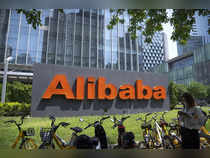 Alibaba boosts share buy back as revenues miss