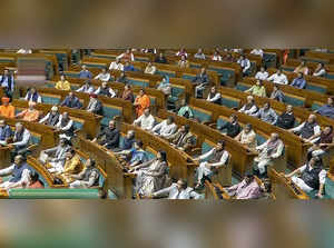 **EDS: VIDEO GRAB VIA SANSAD TV** New Delhi: Parliamentarians in the Lok Sabha d...