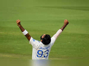Visakhapatnam: India's Jasprit Bumrah with celebrates the wicket of England's ba...