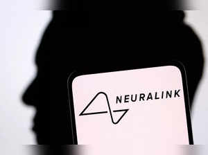 Illustration shows Neuralink logo and Elon Musk silhouette