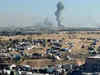 Israel frees two hostages in Rafah under cover of air strike; health officials say 37 killed