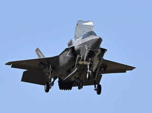 A Lockheed Martin F-35 fighting jet takes part in a flying display at the Farnborough Airshow, in Farnborough, on July 19, 2022.