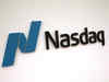 Nasdaq slips from near all-time high, Dow up modestly ahead of inflation data