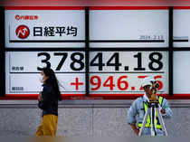 Nikkei soars, dollar steady ahead of US inflation report