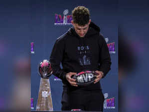 Quarterback Patrick Mahomes #15 of the Kansas City Chiefs poses with the MVP award during a news conference for the winning head coach and MVP of Super Bowl LVIII at the Mandalay Bay Convention Center on February 12, 2024 in Las Vegas, Nevada.