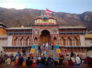 Chamoli: Devotees at the Badrinath Temple as its doors were closed, in Chamoli, ...