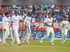 Visakhapatnam: India's bowler Ravichandran Ashwin celebrates with teammates the ...