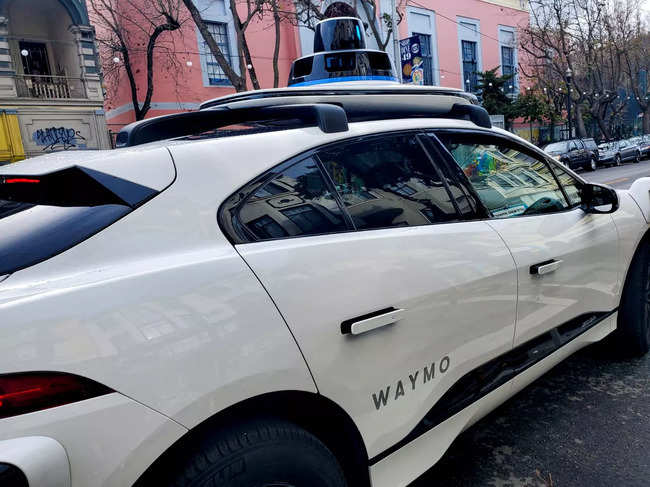 FILE PHOTO: Waymo rider-only robotaxi test ride in San Francisco