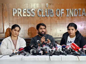New Delhi, Dec 21 (ANI): Wrestler's Sakshi Malik, Vinesh Phogat and Bajrang Puni...