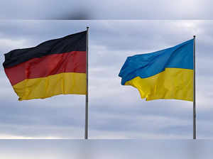 The German (L) and the Ukrainian flag fly in front of the Chancellery in Berlin, Germany on February 16, 2024, prior to the visit of Ukrainian President Zelensky.