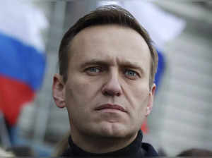 FILE - Russian opposition activist Alexei Navalny takes part in a march in memor...
