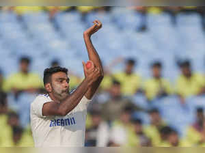 Rajkot: India's Ravichandran Ashwin bowls on day two of the 3rd Cricket Test Mat...