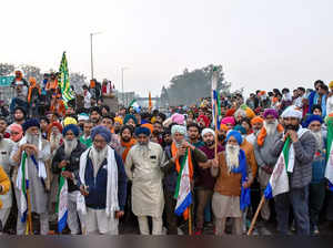 Patiala: Farmers at the Punjab-Haryana Shambhu border during a protest march, in...