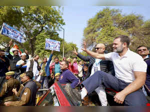Varanasi: Congress leader Rahul Gandhi waves at supporters during the ‘Bharat Jo...