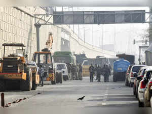 New Delhi, Feb 17 (ANI): Vehicles are parked in rows as police and paramilitary ...