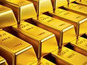 Gold holds steady as traders await Fed minutes