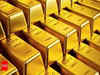 Gold holds steady as traders await Fed minutes
