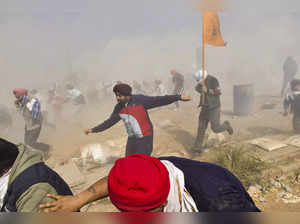 Patiala: Tear gas being fired upon the protesting farmers at the Shambhu Border ...