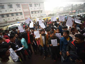 Patna: Students show their documents before appearing in the Bihar Board's class...