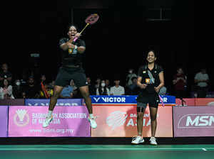 India's Treesa Jolly (L) and Gayatri Gopichand Pullela (R) celebrate after wining against Thailand's Rawinda Prajongjai and Jongkolphan Kititharakul (unseen) in their women's doubles finals match at the 2024 Badminton Asia Team Championships in Shah Alam, Selangor, on February, 18, 2024.