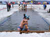 'Totally cold' is not too cold for winter swimmers competing in a frozen Vermont lake