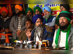 Patiala: Farmer leader Sarwan Singh Pandher with others addresses the media duri...