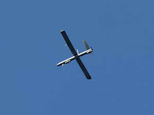 A picture taken from a position in southern Israel along the border with the Gaza Strip on February 15, 2024 shows an Israeli military drone flying above the Gaza Strip, amid ongoing battles between Israel and the Palestinian militant group Hamas.