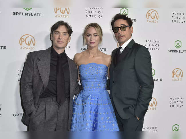 Cillian Murphy, from left, Emily Blunt, and Robert Downey Jr. arrive at the 35th...