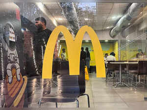 People dine inside a McDonald's restaurant in Mumbai