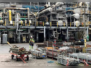 FILE PHOTO: A worker walks at the Yara ammonia plant in Porsgrunn