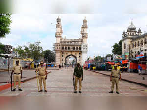 Hyderabad: Police personnel stand guard at Charminar during the Telangana Legisl...