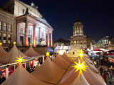 People stroll through the Christmas market in Berlin