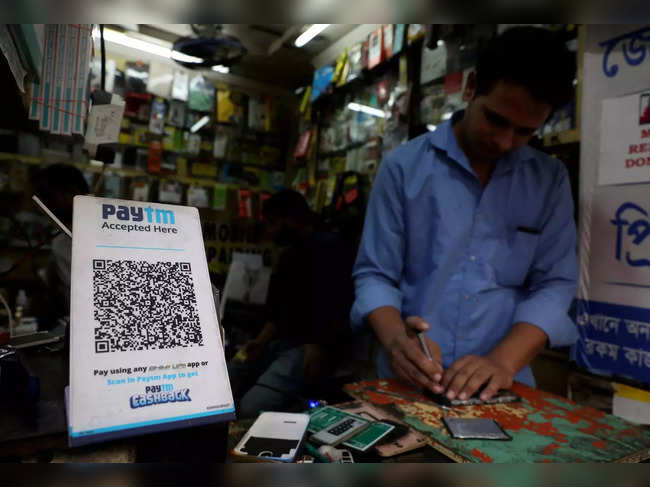 FILE PHOTO_ A QR code of Paytm is seen at a mobile repairing shop in Kolkata.