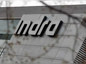 FILE PHOTO: The logo of Spanish technology company Indra is seen on the top of its headquarters in Alcobendas