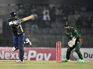 Sri Lanka’s Angelo Mathews (L) plays a shot  during the second Twenty20 international cricket match between Bangladesh and Sri Lanka at the Sylhet International Cricket Stadium in Sylhet on March 6, 2024.