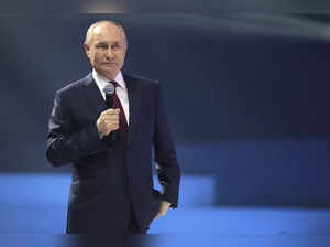 Russian President Vladimir Putin delivers a speech during the closing ceremony o...