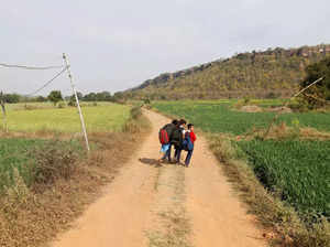 Children walk to a school in the village Goutampur near Bhopal.