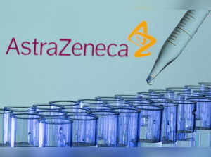 FILE PHOTO: FILE PHOTO: Test tubes are seen in front of a displayed AstraZeneca logo in this illustration