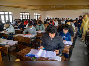 Srinagar: Students appear for the Higher Secondary class 10th board examinations...