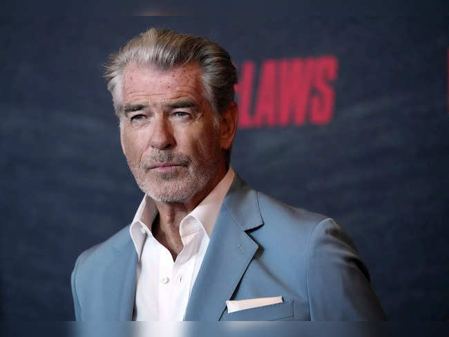 Pierce Brosnan pleads guilty to walking off trail at Yellowstone hot springs, must pay $1,500