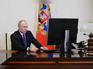 Russian President Vladimir Putin votes online in the presidential election in a residence outside Moscow